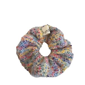 Colorful knitted fuzzy scrunchie with handmade label for women's autumn hair styling