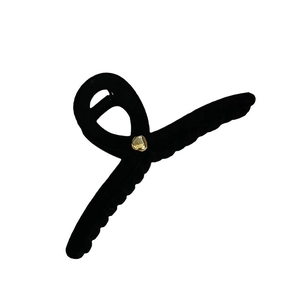 Large black flocked shark hair claw clip with a golden metal bead accent for women