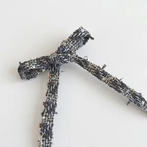 French blue tweed bow hair claw clip with woven fabric and elegant metallic threads