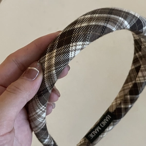 Wide padded brown plaid headband with handmade woven label for elegant hair styling