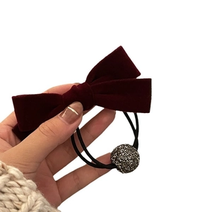 Elegant deep red velvet bow hair tie with sparkling rhinestone ball and elastic black ropes