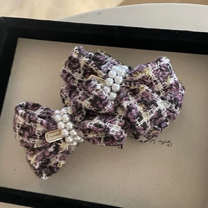 Elegant grape purple tweed bow hair clip with faux pearls and gold finish metal clamp
