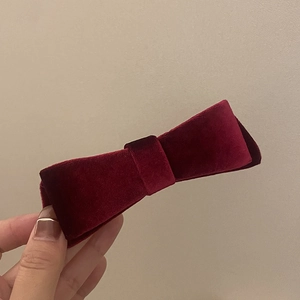 Elegant burgundy velvet bow hair clip with vintage style and metal spring fastener