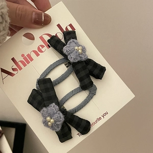 Plaid bow hair clip set with knitted flower and pearls on grey woven bb clips