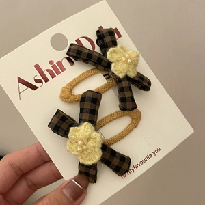 Set of two plaid bow hair clips with yellow knit flowers and pearls for kids