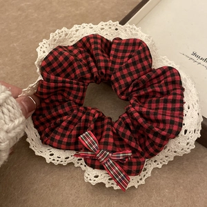 Classic red plaid scrunchie with lace edge and bowknot in a retro aesthetic style