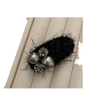 Elegant grey pearl hair clip with black plush texture and sparkling crystal rhinestones