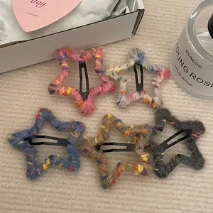 Five colorful star-shaped knit hair clips with soft mixed wool texture for women