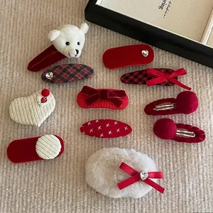 10-piece set of festive red and cream hair clips with plush bears and bows for girls