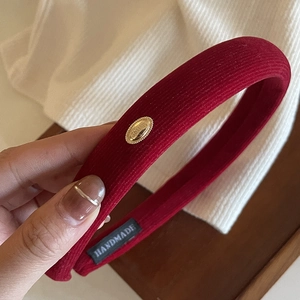 Handmade wine red velvet headband with vertical stripes and golden metal ornament