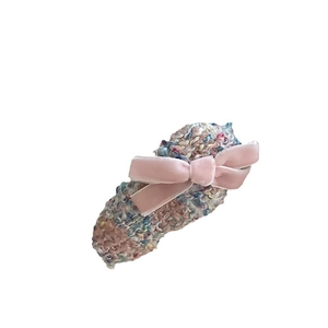 Elegant tweed hair clip with a soft pink velvet bow for women and girls' hairstyles