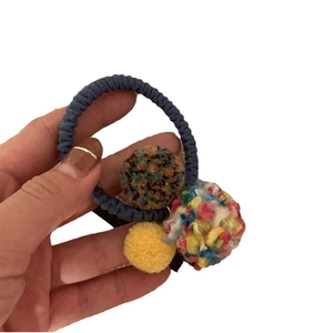 Colorful plush ball hair tie with dark blue woven elastic band for women