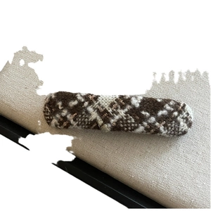 Vintage checkered oval hair clip with brown and gold woven tweed pattern for winter
