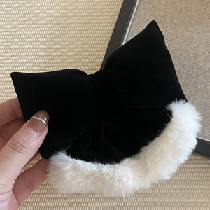 Elegant plush velvet bow hair clip with white faux fur trim for autumn and winter