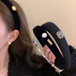 Black velvet headband set with elegant pearls and sparkling rhinestones for women