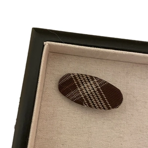 Plaid fabric snap hair clip for women featuring classic British check pattern on oval base