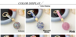 Detail view of sparkling rhinestone sphere keychains in multicolor, blue and pink