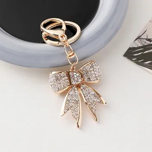 Porte-Clés Nœud Papillon en Strass Élégant Pendentif Alphabet en Métal Anneau de Clé de Voiture Bijoux de Charme de Sac pour Femme