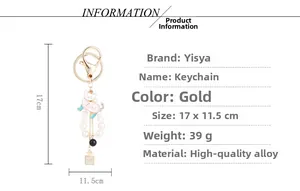 Cat pearl keychain with pink enamel charm and rhinestone perfume bottle pendant details