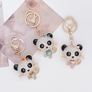 Sparkling rhinestone panda keychain set in gold alloy with colorful enamel details