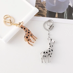 Sparkling rhinestone giraffe keychain set in gold and silver finish with lobster clasp