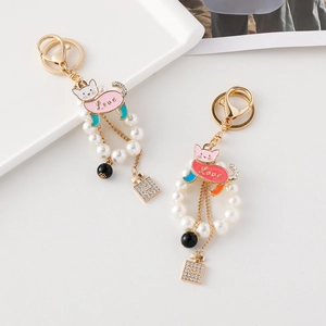 Cat pearl keychain with enamel love charms and rhinestone squares in two sweet colors