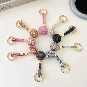 Fashion sparkling rhinestone ball keychains set with golden spring clips and matching straps