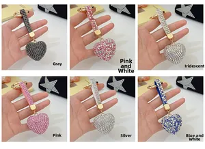 Showcase of six rhinestone-encrusted heart keychains in various colors with wrist straps