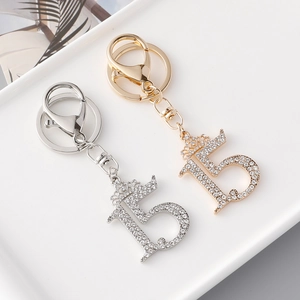 Sparkling number 15 crown keychains in gold and silver metal with rhinestones