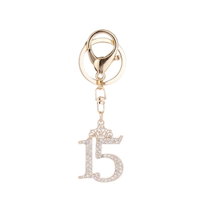 Elegant gold crown number 15 keychain with sparkling rhinestones for bags