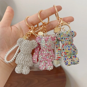 Sparkly rhinestone cartoon bear keychain set with gold metal clasp and luxury hand strap