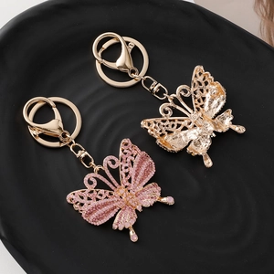 Eleganter Schmetterling-Schlüsselanhänger mit Strass und goldenem Karabinerhaken