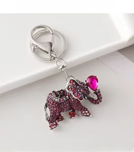 Detailed view of luxury elephant keychain with purple rhinestones and pink crystal heart