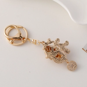 Golden Chinese lucky character keychain with fortune toad charm and elegant lobster clasp