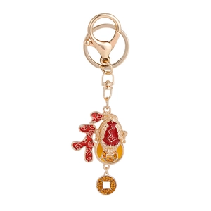 Golden Chinese lucky toad keychain with red Fu pendant and sparkling rhinestones