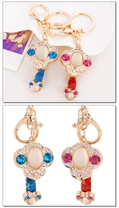 Macro view of Chinese style Ruyi keychain with moonstone and sparkling rhinestones