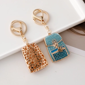 Cute heart backpack keychain set with rhinestones and gold metal finish for bags
