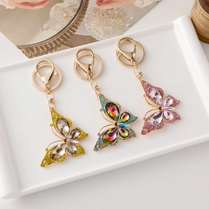 Porte-clés papillon exquis avec cristaux colorés et fermoir mousqueton doré élégant