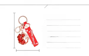 Detailed spec view of a red dragon keychain with alloy ring and sweet heart rubber strap
