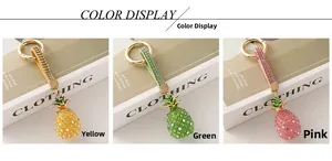Detailed color display of yellow, green and pink rhinestone pineapple keychains