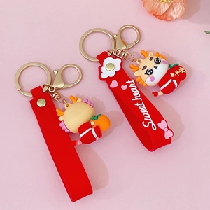 Cartoon Chinese dragon keychain set with red silicone straps and golden metal rings