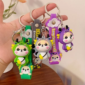 Cute cartoon dragon zodiac keychains with soft silicone wristlets in green, grey, and purple