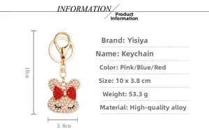 Detailed view of pearl rabbit keychain with red bow and size dimensions 10x3.8 cm