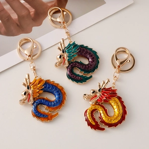 Exquisite enameled metal Chinese dragon keychains in gold finish for bag charms