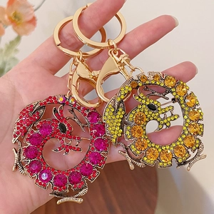 Porte-clés et broche Dragon du Zodiaque Chinois avec cristaux colorés et finition dorée