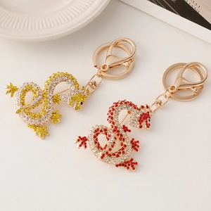 Portachiavi con drago cinese con cristalli luccicanti in colori oro e rosso per borse