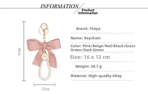 Pink ribbon bow pearl keychain size specifications showing 16x12cm dimensions and alloy material