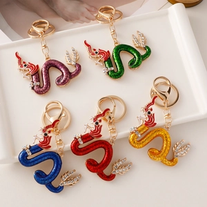 Chinese dragon zodiac keychains with enamel scales and sparkling rhinestones in five colors