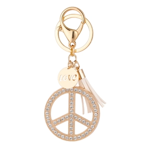 Golden peace sign keychain with white rhinestones, tassel, and engraved LOVE charm