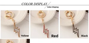 Three color variants of iced-out lightning bolt keychains with rhinestones and gold plating